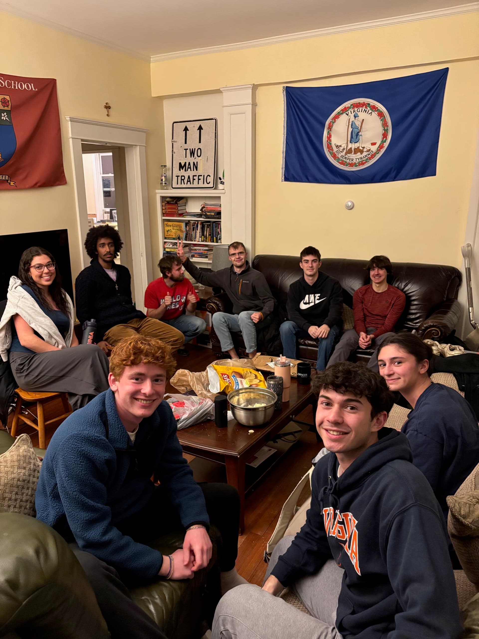 Students hanging out together in a living room